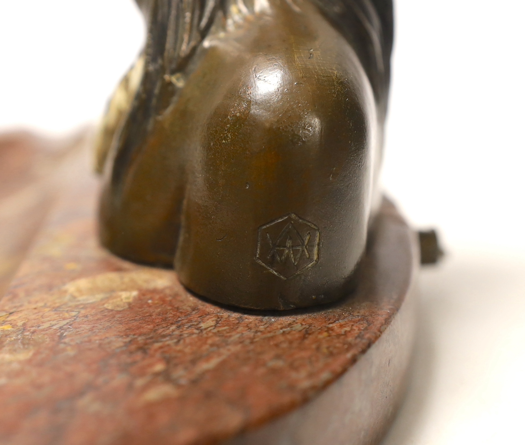 An ashtray in the form of a bronze native American, on marble base, 21cm wide